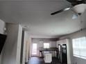 Open concept kitchen with white cabinets, stainless steel appliances, granite countertops, and island at 3242 Cascade Parc Sw Blvd, Atlanta, GA 30311