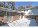 The house has an outdoor area with brick facade and a bright walkway at 1038 Seven Springs Cir, Marietta, GA 30068