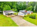Spacious property featuring a detached two-car garage and long driveway at 336 Burnt Hickory Rd, Powder Springs, GA 30127