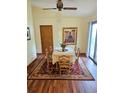 Inviting dining area featuring a table set for six and sliding glass door at 162 Apple Valley Dr, Woodstock, GA 30188