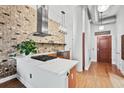 Modern kitchen with stainless steel appliances, marble countertop, and a gas cooktop at 3820 Roswell Ne Rd # 705, Atlanta, GA 30342