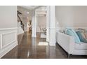 Inviting home foyer featuring gleaming hardwood floors and elegant trim at 3670 Casual Ridge Way, Loganville, GA 30052