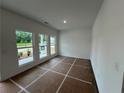 Bright living room with large windows providing ample natural light at 2101 Boxwood Circle Se, Conyers, GA 30094