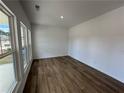 Bright living room with large windows and beautiful hardwood flooring at 2101 Boxwood Circle Se, Conyers, GA 30094