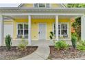 Cozy front porch with seating, perfect for relaxing and enjoying the neighborhood views at 1112 Birch Sw St, Atlanta, GA 30310