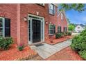 Elegant brick home with a welcoming front entrance and manicured landscaping at 602 Jules Crest Ct, Lawrenceville, GA 30045