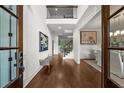 Elegant foyer showcasing soaring ceilings, hardwood floors, and classic architectural details at 885 Old Peachtree Ne Rd, Lawrenceville, GA 30043