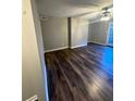 Bright living room with new flooring and a ceiling fan at 123 Rue Fontaine, Lithonia, GA 30038