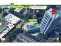 An aerial view shows nearby retailers and private access to shopping near this home, highlighted by a red star at 2870 Pharr Court South Nw # 901, Atlanta, GA 30305