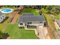 Aerial view of a well-maintained single-story home with a pool and landscaped backyard at 283 Norton Se Cir, Smyrna, GA 30082