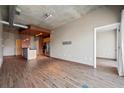 Spacious open-plan living area with sleek hardwood floors and modern design at 943 Peachtree Ne St # 1010, Atlanta, GA 30309