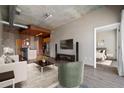 Comfortable living room showcasing hardwood floors, stylish furniture, and modern decor at 943 Peachtree Ne St # 1010, Atlanta, GA 30309
