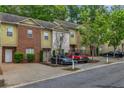 Lovely townhome with manicured landscaping, ample parking, and a desirable neighborhood at 3037 Bonnes Dr, Lithonia, GA 30038
