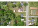 Aerial view of the property showing the home's location on a 0.62-acre lot in Oxford, GA at 405 Emory St, Oxford, GA 30054