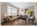 Cozy home office with a comfortable couch, desk and plenty of natural light at 1382 Benbrooke Nw Ln, Acworth, GA 30101