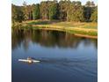 Beautiful lake view with clear water and dense trees at 171 Silvercrest Dr, Acworth, GA 30101