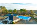 Aerial view of community pool and tennis courts at Water Oak Estates at 1831 Lacebark Elm Way, Lawrenceville, GA 30045