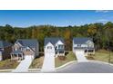 Well-planned community with manicured lawns and coordinated home styles at 1871 Lacebark Elm Way Way, Lawrenceville, GA 30045