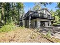 This lovely two-story home offers a spacious deck and a convenient two-car garage at 2830 Jodeco Dr, Jonesboro, GA 30236
