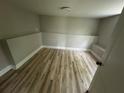 Neutral bedroom with wood-look floors and a clean, simple aesthetic at 1691 Flat Shoals Rd, Atlanta, GA 30316