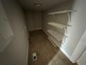 Storage area with shelves and tile flooring at 1691 Flat Shoals Rd, Atlanta, GA 30316