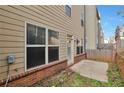 The backyard has a small patio and fencing at 137 Staley Dr, Tucker, GA 30084