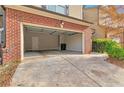 Spacious two-car garage with an automatic door and ample space at 137 Staley Dr, Tucker, GA 30084