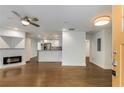Open-concept living area with hardwood floors, modern fireplace, and seamless flow to the kitchen at 435 Mcwilliams Se Ave, Atlanta, GA 30316