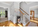 Inviting foyer with hardwood floors, staircase, and traditional decor at 3330 Arborwoods Dr, Alpharetta, GA 30022
