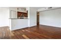 Bright living room with gleaming hardwood floors and an open floor plan for modern living at 275 13Th Ne St # 605, Atlanta, GA 30309
