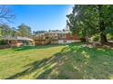 Spacious backyard with a wooden deck, perfect for outdoor entertaining and relaxation at 1468 North Amanda Cir, Atlanta, GA 30329