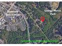 Aerial view of property location in relation to Suwanee Town Center, George Pierce Park, and Suwanee Creek Greenway Trail at 3781 Cherokee Trl, Suwanee, GA 30024