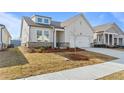 Attractive single-Gathering home with a two-car garage and well-maintained landscaping at 1682 Juniper Berry Way, Loganville, GA 30052