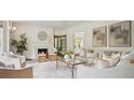 Inviting living room featuring a cozy fireplace and stylish, neutral decor at 2672 Birchwood Dr, Atlanta, GA 30305