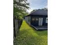 Exterior side yard shows a long fenced-in yard space, offering privacy at 1286 Allene Sw Ave, Atlanta, GA 30310