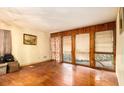 Cozy living room with a window to bring natural light and hardwood floors at 1491 Boulderwoods Dr, Atlanta, GA 30316