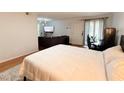 Inviting bedroom that flows into the living area, featuring modern furnishings and ample space at 1150 Collier Nw Rd # 25D, Atlanta, GA 30318