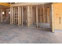 Unfinished interior, framed-out walls, and visible wiring ready for customization and design at 452 Maypop Lane, Woodstock, GA 30188