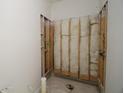 Unfinished bathroom framing showcases the shower area, providing a blank canvas for a custom design at 452 Maypop Ln, Woodstock, GA 30188