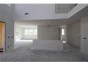 Spacious living room featuring high ceilings, large windows, and an open layout, ready for customization at 452 Maypop Ln, Woodstock, GA 30188