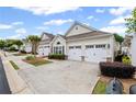 Well-maintained home with a two-car garage, beautiful landscaping and inviting curb appeal at 329 Acuba Vw, Woodstock, GA 30188