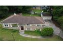 Charming brick ranch with a detached two-car garage and well-maintained yard at 4961 Ivey Road, Acworth, GA 30101