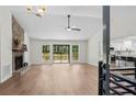 Spacious living room features a stone fireplace and seamless access to outdoor deck at 641 Charing Cross Dr, Marietta, GA 30066