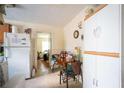 Functional kitchen with ample storage, a small dining table, and white appliances at 1336 Sharon St, Atlanta, GA 30314