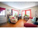 Cozy living room with hardwood floors, bright windows, and comfortable seating at 1336 Sharon St, Atlanta, GA 30314