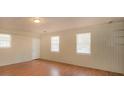 Bonus room with natural light, classic trim, and paneled walls at 6575 Wendell Cir, Morrow, GA 30260
