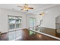 Bright living room featuring a large mirror and dark hardwood floors at 221 Semel Nw Dr # 273, Atlanta, GA 30309