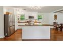 Modern kitchen featuring stainless steel appliances, an island, and wood countertops at 3344 Ridgecrest Dr, Powder Springs, GA 30127