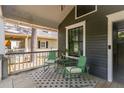 Inviting front porch with seating area, ideal for relaxing and enjoying the neighborhood at 23 Clifton Ne St, Atlanta, GA 30317