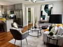 Cozy living room featuring hardwood floors and modern decor with neutral color palette at 3153 Bonway Dr, Decatur, GA 30032